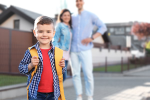 Child with a school bag